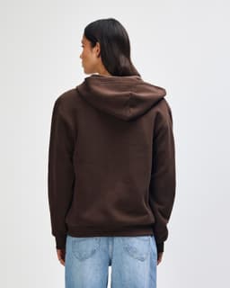 A brown unisex full zip hooded sweatshirt with a hood and ribbed cuffs, viewed from the back.