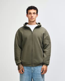 A unisex full zip hooded sweatshirt in olive green, featuring a hood and front zipper. It has a logo on it.
