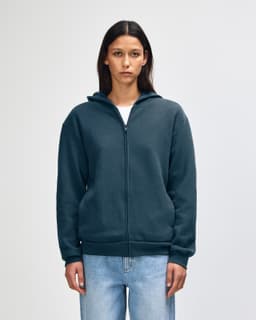 A navy full zip hooded sweatshirt with a front zipper and a hood, featuring a logo.