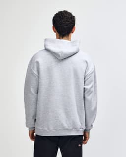 A unisex hooded sweatshirt in grey, featuring a hood and a relaxed fit with a branding logo.