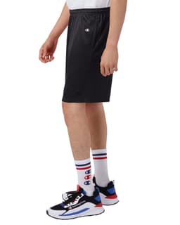 Black mesh sports shorts with pockets, featuring a logo, worn with colourful socks and sneakers.
