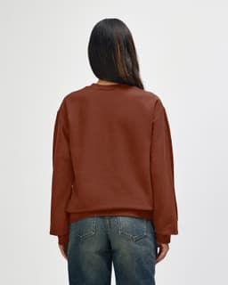 A brown Gildan Softstyle adult sweatshirt viewed from the back, featuring long sleeves and a relaxed fit.