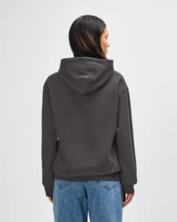 A hooded sweatshirt in a muted olive green, featuring a logo and set against a plain background.