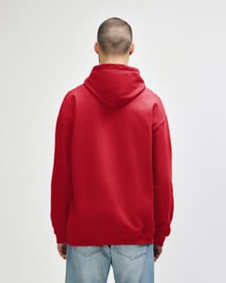 A red Gildan Softstyle adult hooded sweatshirt shown from the back, featuring a hood and long sleeves.