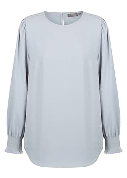 A light blue blouse featuring shirred cuffs and a rounded neckline, with a keyhole back detail.