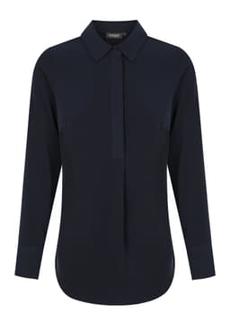 A navy shirt featuring a half placket, long sleeves, and a collar. The design includes a logo.