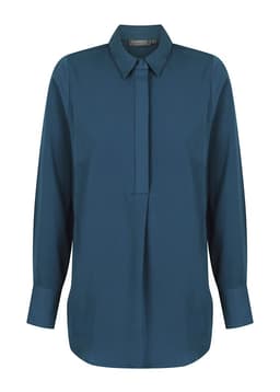 A dark teal shirt with a half placket and long sleeves, featuring a collar and a branding logo.