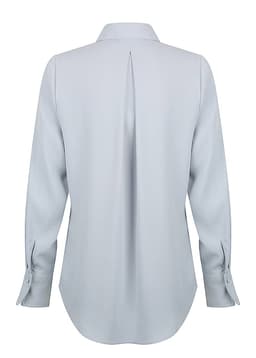 A light blue shirt with a half placket and long sleeves, featuring a back pleat and buttoned cuffs.