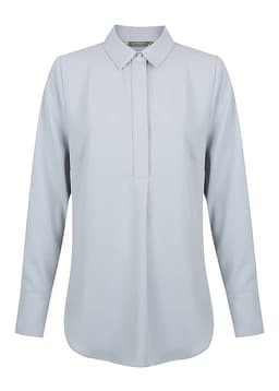 A light grey long-sleeve shirt with a half placket and a collar, featuring a logo on the label.