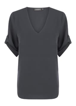 A dark grey v-neck shirt with rolled sleeves and a small branding logo.