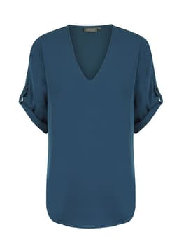 A teal V-neck shirt with rolled-up sleeves and a smooth, structured design. It has a brand logo on the label.