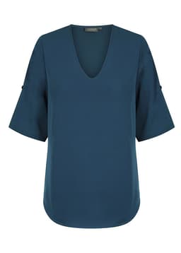 A teal V-neck shirt with short sleeves and a curved hem, featuring subtle detailing at the sleeves.