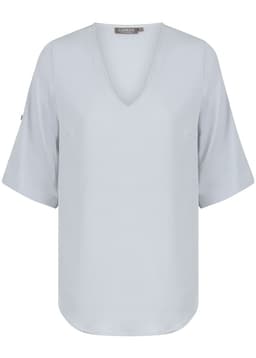 A light grey V-neck shirt with short sleeves and a brand logo on the side.