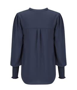 A navy long sleeve top featuring a pleated back and gathered cuffs. The design is simple and elegant.