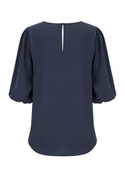 A dark navy puff sleeve top featuring a keyhole back detail and a smooth fabric finish. The top has an understated design.