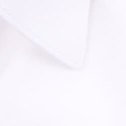 A white shirt featuring a pointed collar and a smooth texture. The shirt has a subtle sheen and a logo.