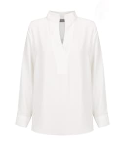 Asha Long Sleeve Top in white, featuring a half-open neck and long sleeves. It has a subtle branding detail.