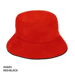 A red and black bucket hat featuring a logo and a wide brim for sun protection.