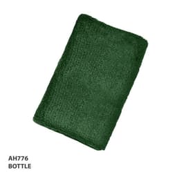 A green wristband made of soft material, featuring a logo or branding.