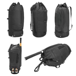 A black sports bag with multiple compartments, featuring a solid design and a logo, and a pair of shoes shown at the base.