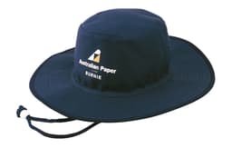 A navy blue canvas hat with a wide brim and an adjustable chin strap, featuring a logo.