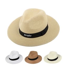A wide brim Panama hat in beige with a black band, alongside variations in white and tan. Features a logo.