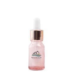 A 10ml rose gold glass dropper bottle with a white dropper top and a logo design.