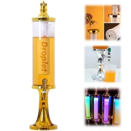 A drink tower in clear plastic with a gold base, featuring illuminated sections and a tap for dispensing beverages.