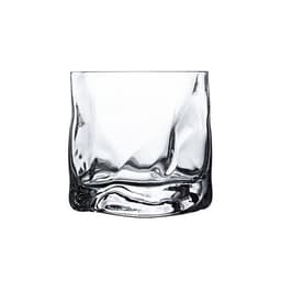 A clear irregular whiskey glass with a unique wave design and a thick base, suitable for serving drinks.