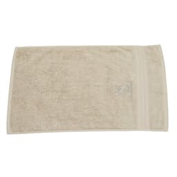 A beige embroidered cotton hand towel featuring a logo on one side.