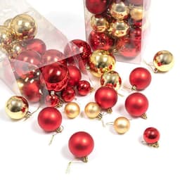 A collection of red and gold Christmas ornament balls in transparent packaging, featuring various sizes and glossy finishes.