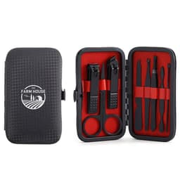 A black manicure set with red interior, containing nail clippers, scissors, tweezers, and grooming tools, in a zippered case.