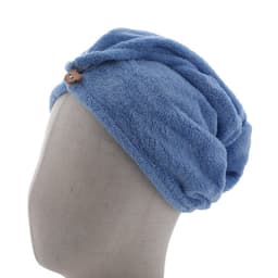 A blue coral fleece hair towel wrap displayed on a mannequin head, featuring a button detail.
