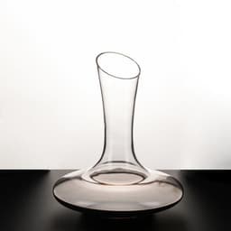 A glass 1.8L red wine decanter with a curved design, featuring a sleek and elegant shape.