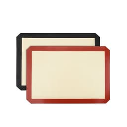 Two non-stick silicone baking mats in black and red, featuring a textured surface and contrasting edges.