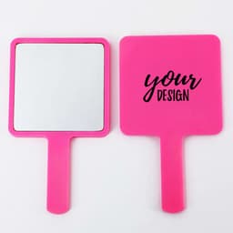 A square handle makeup mirror with a bright pink frame, featuring a blank side for custom designs.