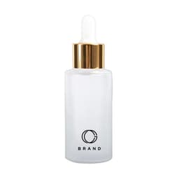 A frosted glass dropper bottle with a white body and a gold lid, featuring a logo.