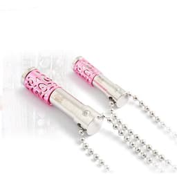 A pink and silver perfume bottle pendant necklace with intricate cut-out designs and a bead chain.