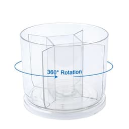 A transparent rotating pen holder with several sections for organising pens and office supplies.