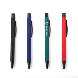 A collection of four retractable pens in black, navy, green, and red with rubber finishes and clips.