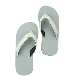 Beach flip flops in green and white with a black strap, featuring a logo on the side.