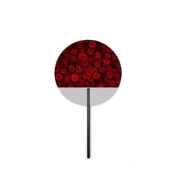 A round fan featuring a design of red roses with a black handle. It has a white lower section and a logo.