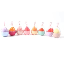 A collection of eight pastel-coloured beauty eggs with lanyards, arranged in a row. Each egg features a two-tone design.