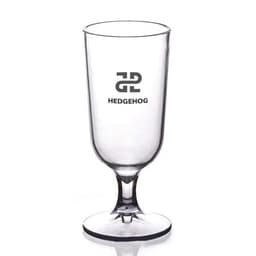A clear plastic goblet with a stem, featuring a logo on the side, designed for serving beverages.