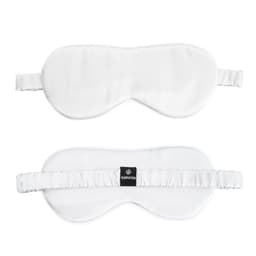 A white mulberry silk sleep mask set with elastic straps and a logo on one side.