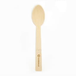 A biodegradable disposable bamboo spoon in a natural beige colour, featuring a subtle logo.