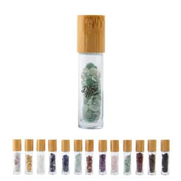 A 10ml natural gemstone roller ball bottle with a bamboo lid and assorted coloured gemstones inside.