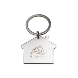 A stainless steel keychain shaped like a house, featuring a mounted logo and a silver ring.