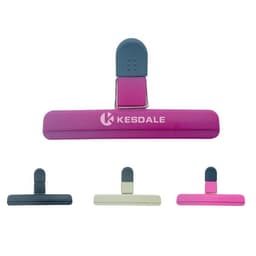A large chip bag clip in various colours including pink, grey, and cream, with a logo on the clip.