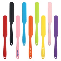 A collection of long handle silicone cream spatulas in various colours, including black, blue, green, orange, yellow, pink, and purple.